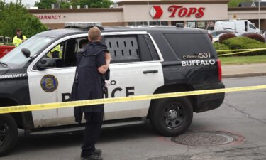 Police and FBI agents continue their investigation of the shooting at Tops Market on May 16 in Buffalo