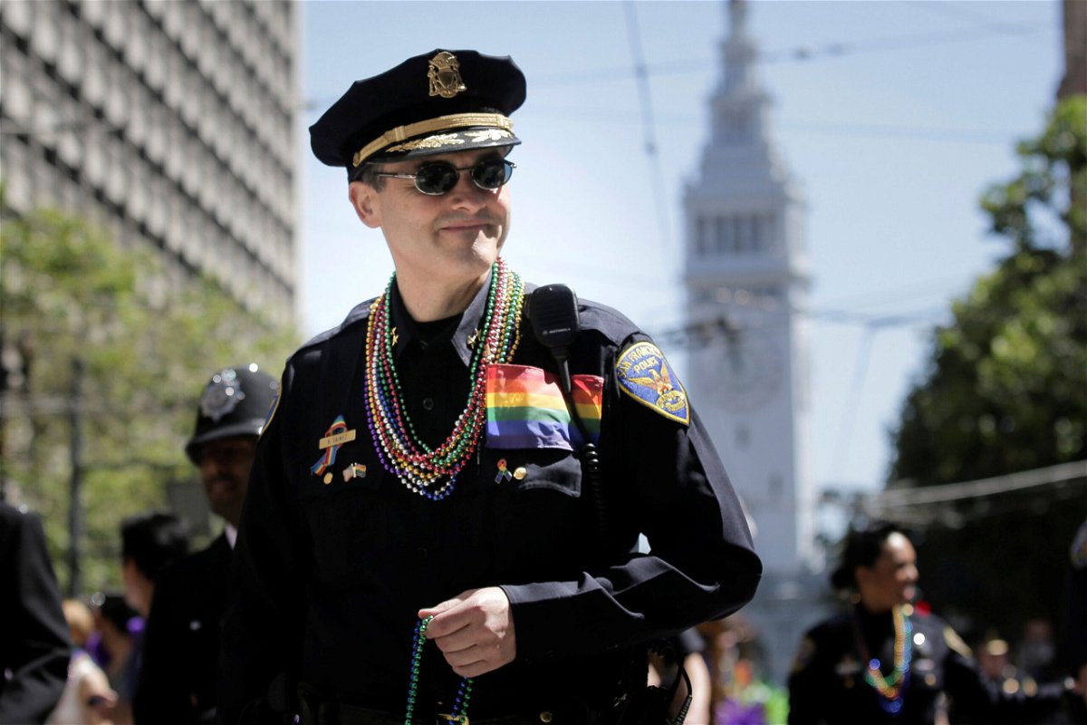 <i>Elijah Nouvelage/Reuters</i><br/>A San Francisco Police officer marches in the city's Pride parade in 2016.