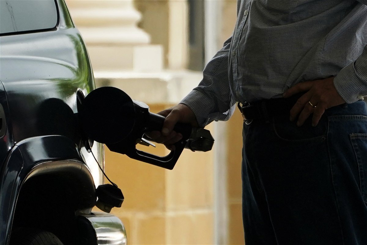 <i>Rogelio V. Solis/AP</i><br/>Gas prices hit yet another record high. A customer pumps gas into his vehicle