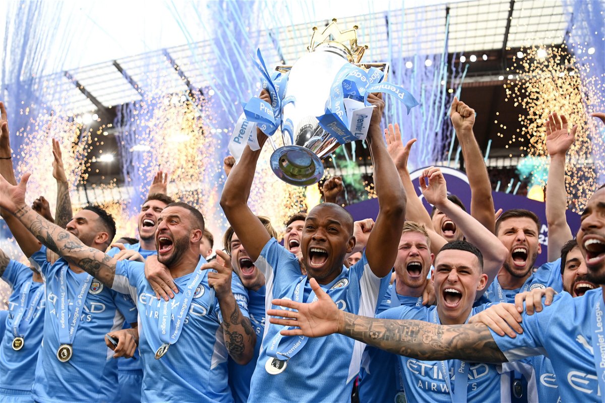 <i>Michael Regan/Getty Images Europe/Getty Images</i><br/>Manchester City lifts the trophy after a memorable title race against Liverpool.