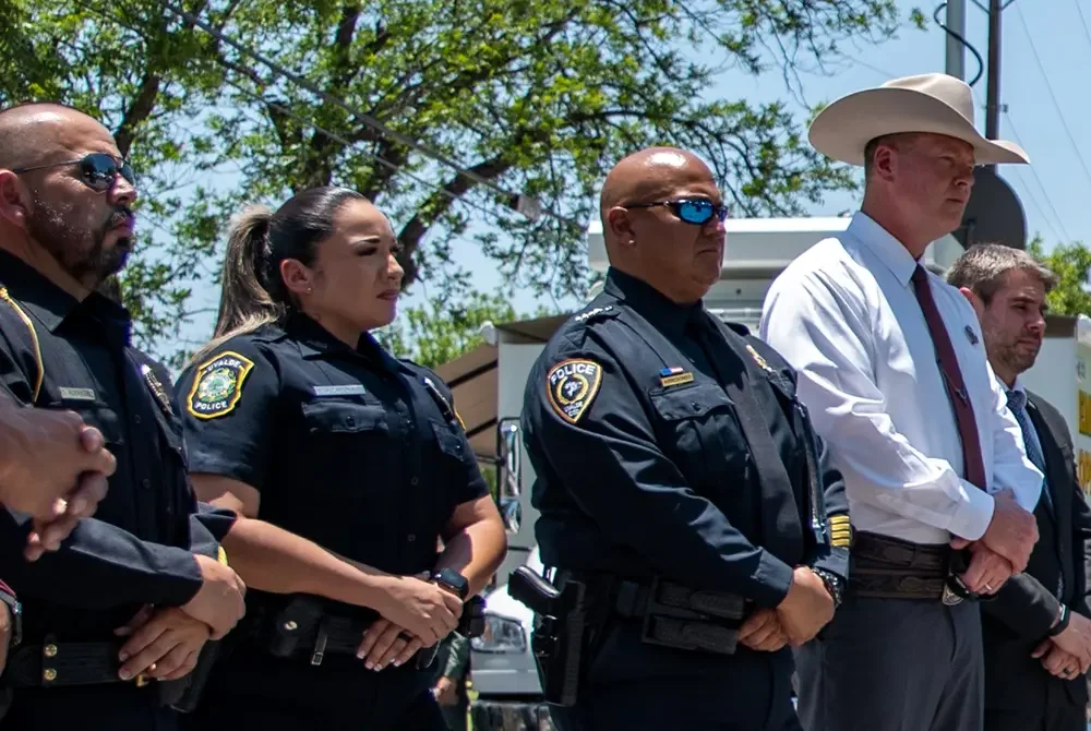 Uvalde school police Chief Pete Arredondo, third from left, stood with law enforcement officers at a May 26 Department of Public Safety press conference in Uvalde.