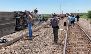 Damage from the Missouri train derailment is shown.