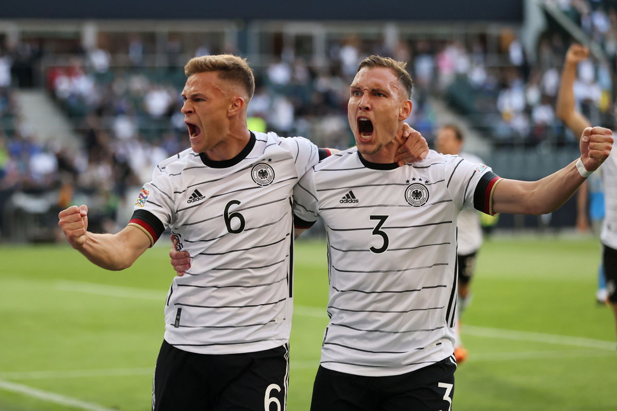 <i>Martin Rose/Getty Images Europe/Getty Images</i><br/>Joshua Kimmich (left) scored Germany's first goal against Italy.