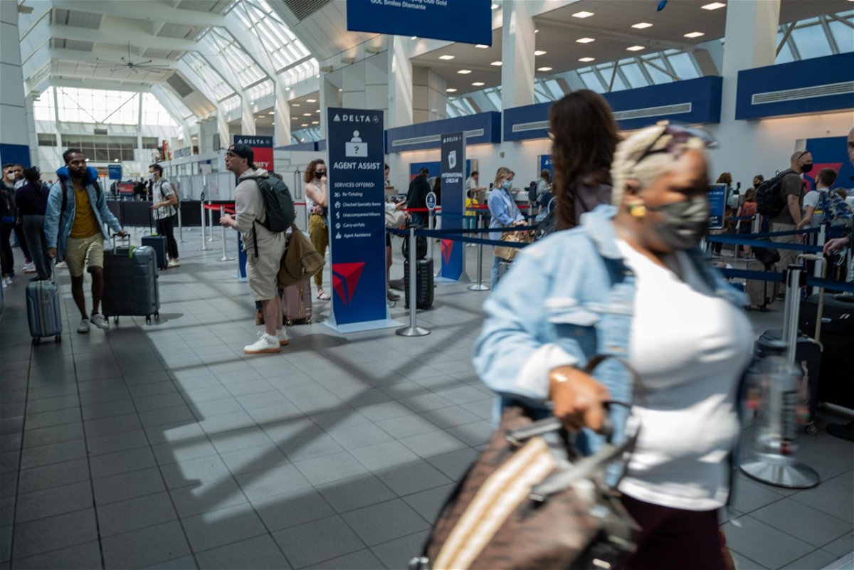 <i>Spencer Platt/Getty Images</i><br/>People travel through the terminal at John F. Kennedy Airport at the start of the Memorial Day weekend on May 27