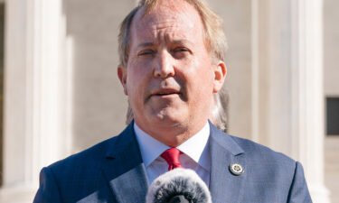 Texas Attorney General Ken Paxton speaks to  anti-abortion activists outside the Supreme Court
