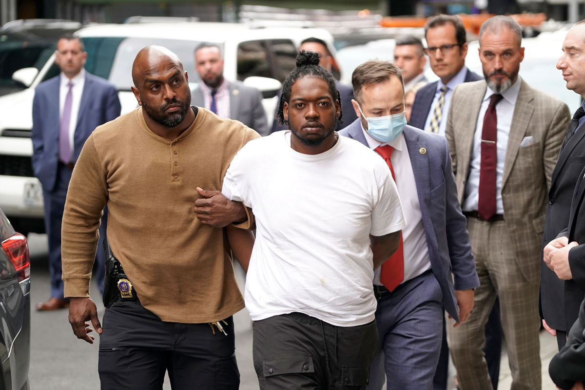 <i>Barry Williams/New York Daily News/Tribune News Service/Getty Images</i><br/>Andrew Abdullah is escorted into the 5th Precinct on Tuesday