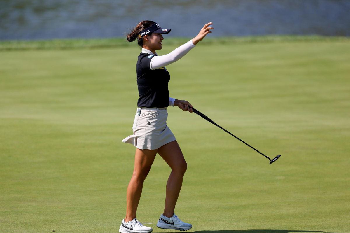 <i>Rob Carr/Getty Images</i><br/>Chun celebrates making her putt for par on the 18th green to win.