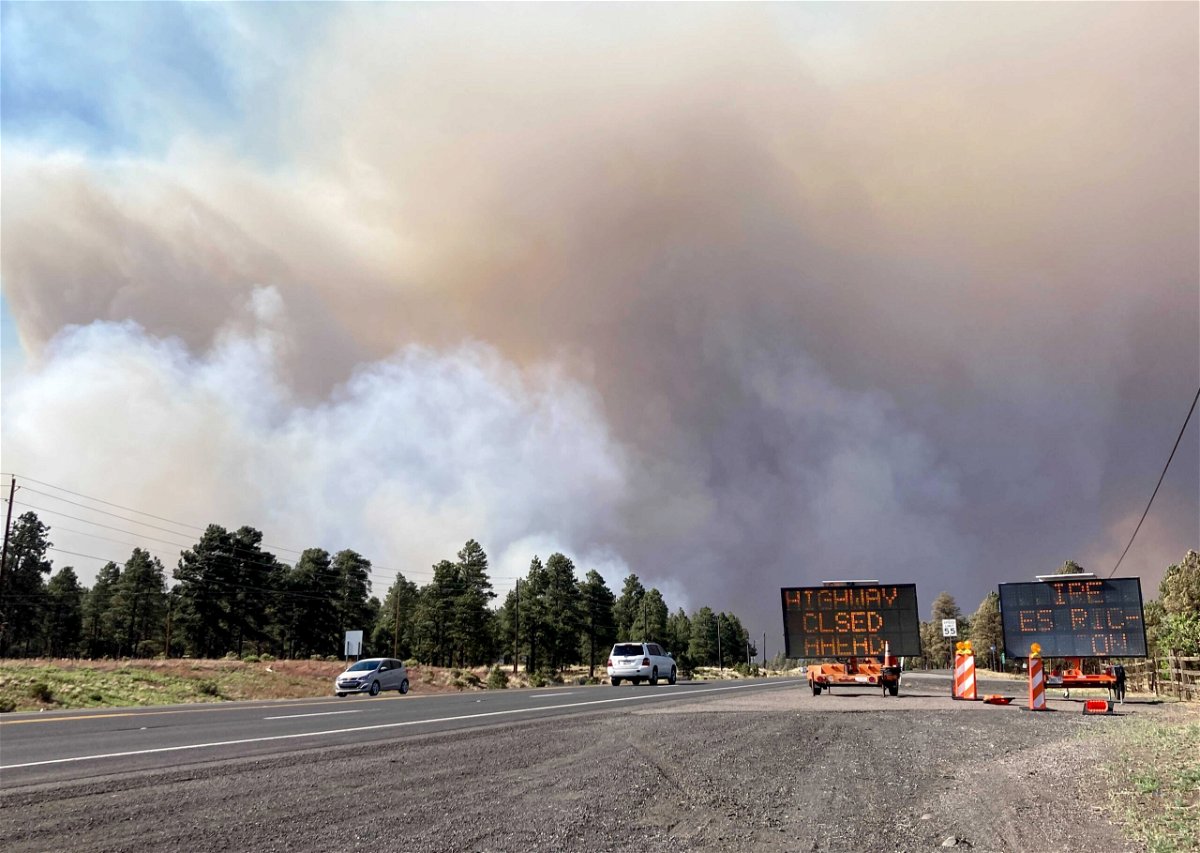 <i>Felicia Fonseca/AP</i><br/>Authorities evacuated hundreds of households due to a fire in the outskirts of Flagstaff