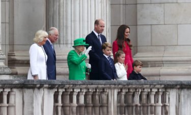 Britain's Queen Elizabeth II made a surprise appearance on the balcony of Buckingham Palace on Sunday