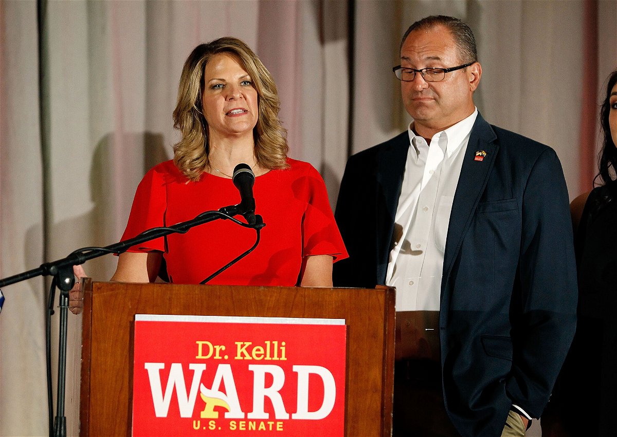 <i>Ralph Freso/Getty Images</i><br/>Arizona Republican Party Chair Kelli Ward and her husband