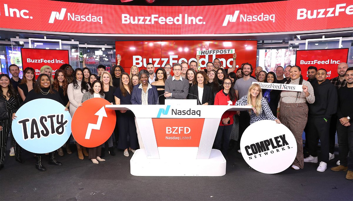 <i>Bennett Raglin/Getty Images for BuzzFeed Inc.</i><br/>Founder and CEO of BuzzFeed Jonah H. Peretti and BuzzFeed are seen on stage as they are preparing to ring a bell during BuzzFeed Inc.'s Listing Day at Nasdaq on December 06