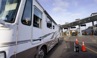 An RV driver heads into the U.S. from Canada after passing through the Peace Arch border crossing Monday