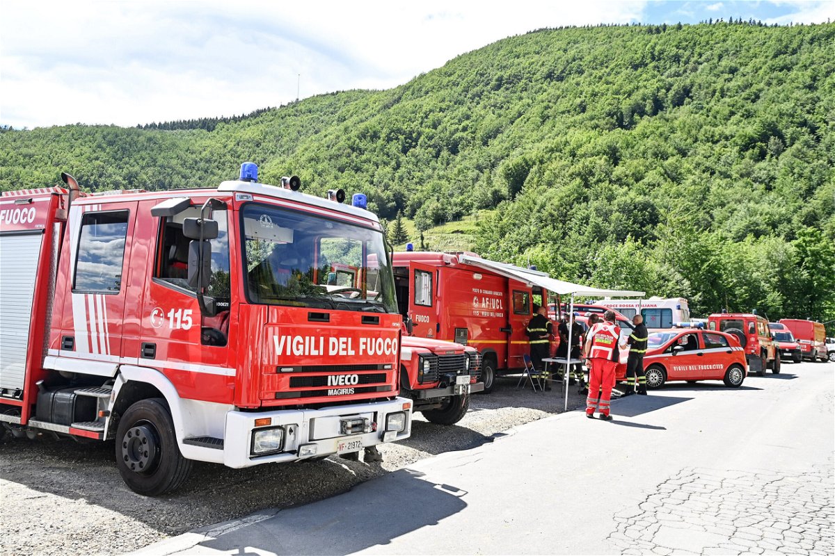 <i>Carlo Bressan/Anadolu Agency/Getty Images</i><br/>Rescue teams search for the missing helicopter on Saturday in Pievepelago