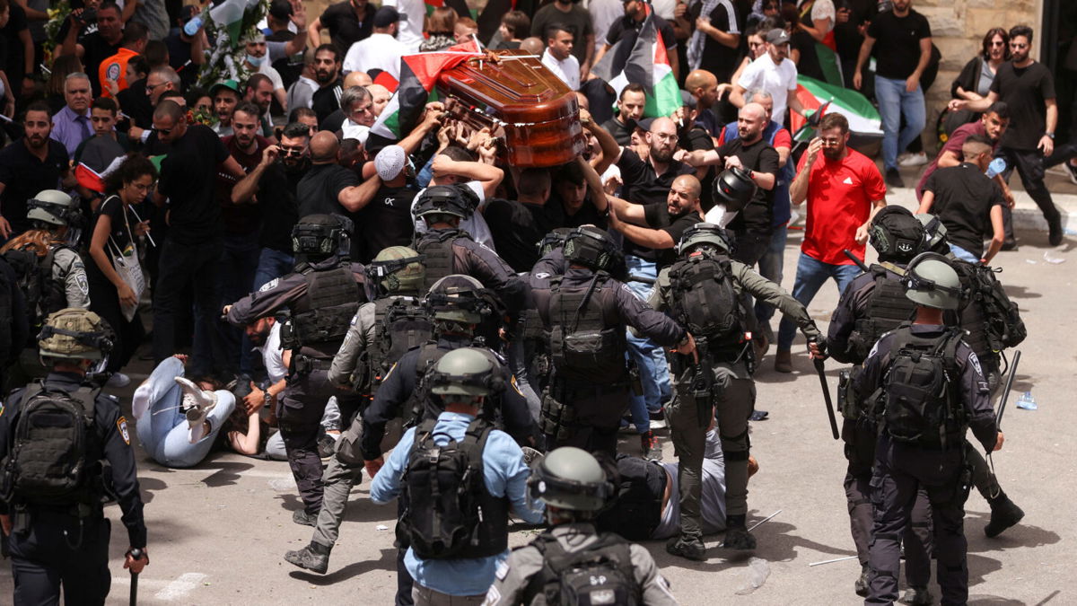 <i>Ammar Awad/Reuters</i><br/>Israeli police say they have concluded the investigation into police actions during the funeral procession of slain Al Jazeera correspondent Shireen Abu Akleh in Jerusalem.
