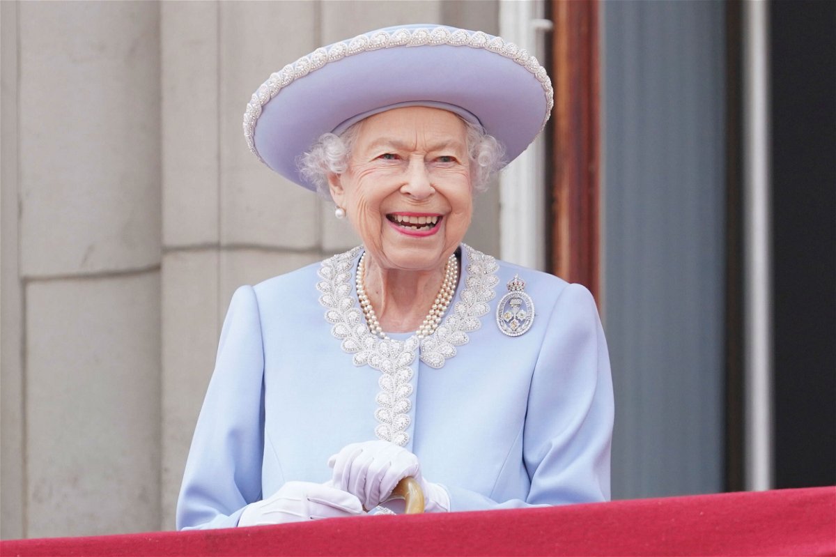 <i>Jonathan Brady/Pool/AP</i><br/>Queen Elizabeth II watches from the balcony during the Trooping the Color ceremony at Horse Guards Parade in London