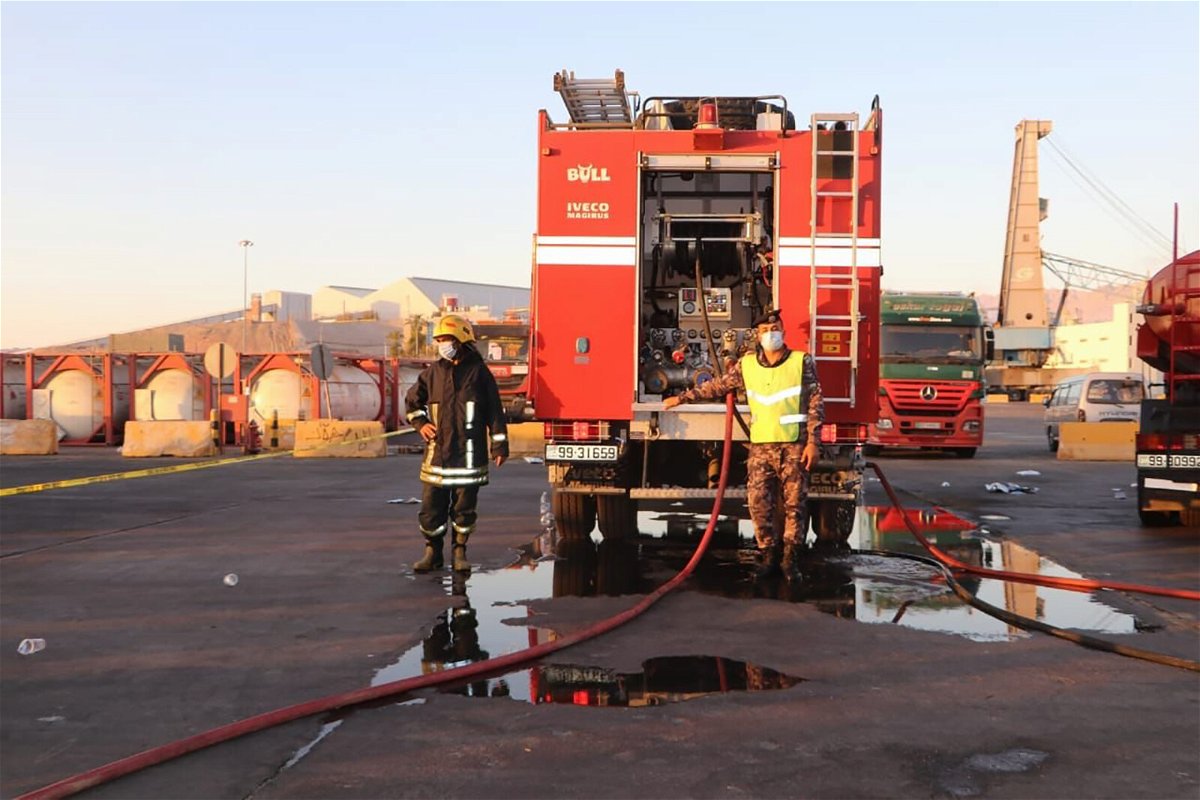 <i>Jordanian Public Security</i><br/>Emergency response teams respond to the toxic gas leak at the port of Aqaba in Jordan on June 27.