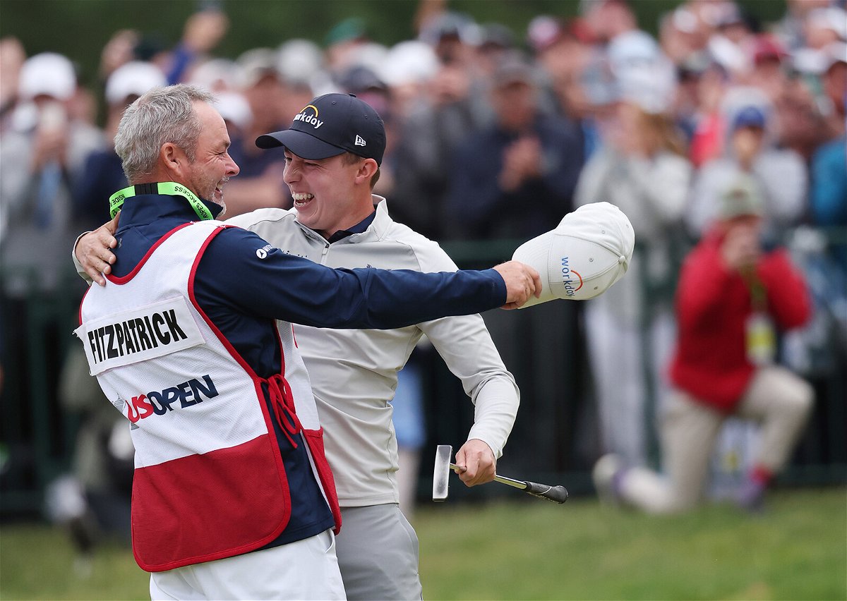 <i>Warren Little/Getty Images</i><br/>Fitzpatrick celebrates with caddie Billy Foster after winning the US Open.