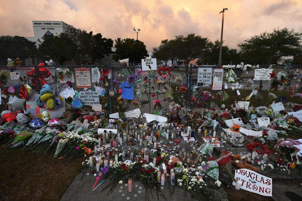 <i>Matt McClain/The Washington Post/Getty Images</i><br/>A makeshift memorial is seen outside Marjory Stoneman Douglas High School in February 2018. According to testimony in the penalty phase of his trial