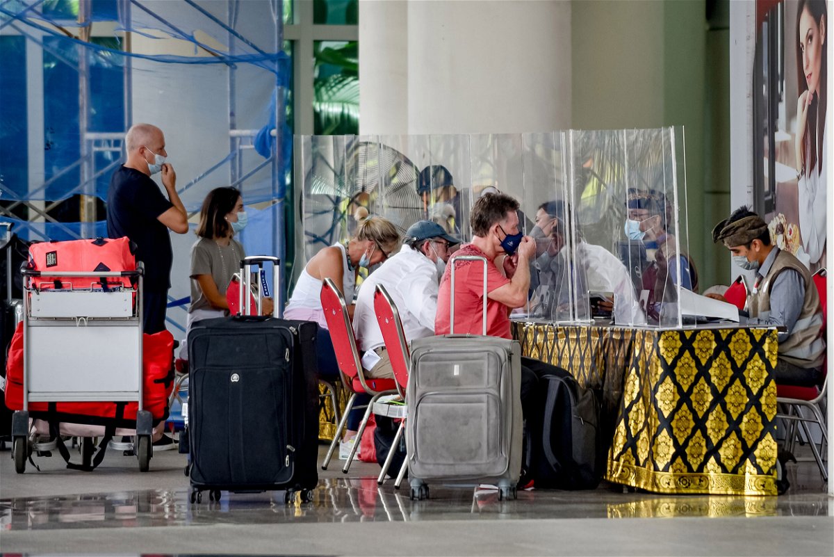 <i>Bisinglasi/Xinhua/Getty Images</i><br/>International travelers at Ngurah Rai International Airport in Bali