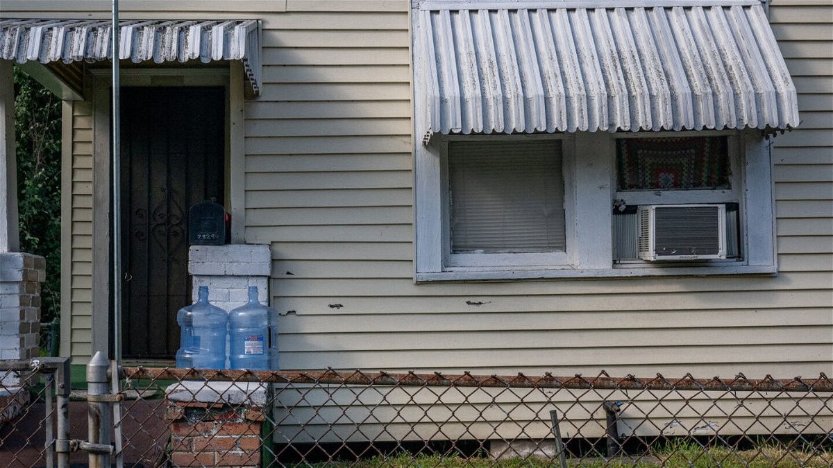 <i>Brandon Bell/Getty Images</i><br/>Empty water jugs are seen on a porch on June 10 in Houston