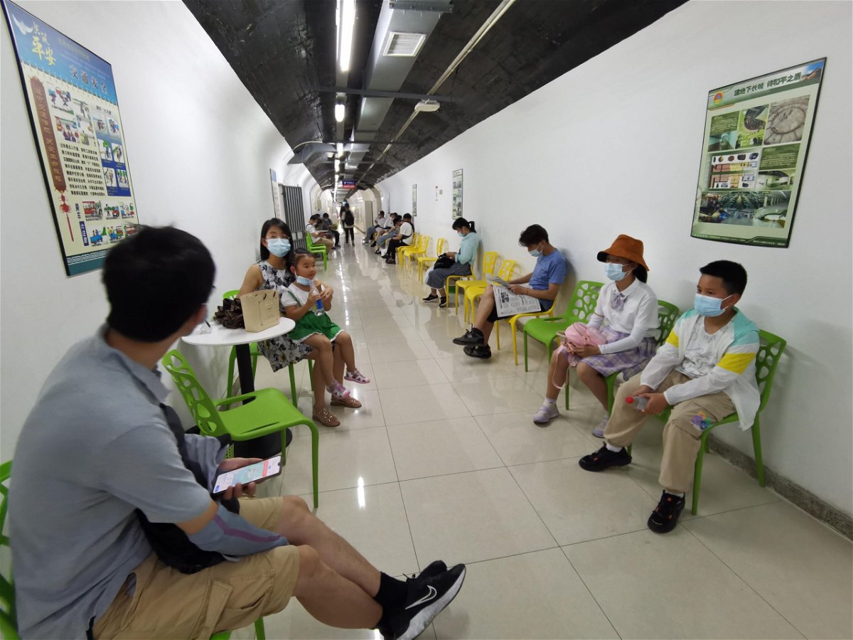 <i>VCG/Getty Images</i><br/>People escape the heat by heading to an air raid shelter in Nanjing