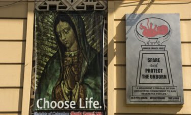 An anti-abortion poster on the sides of a building in Manila.