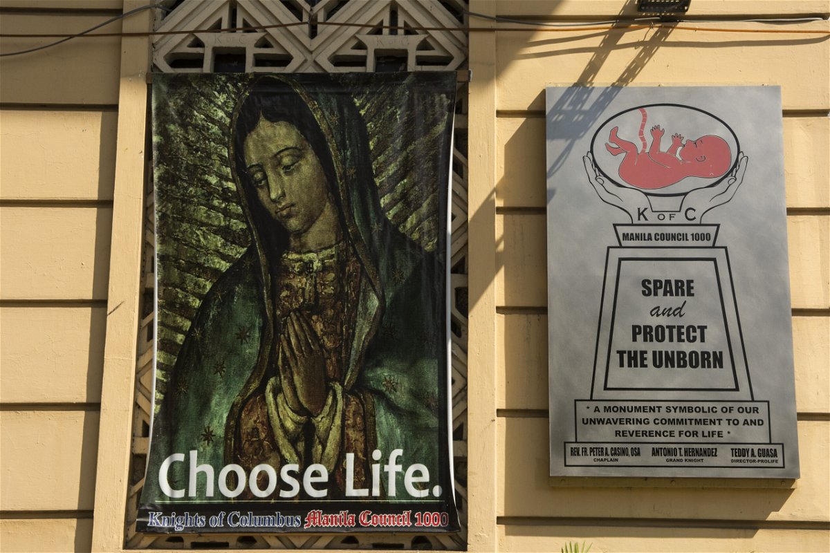 <i>Thierry Falise/LightRocket/Getty Images</i><br/>An anti-abortion poster on the sides of a building in Manila.