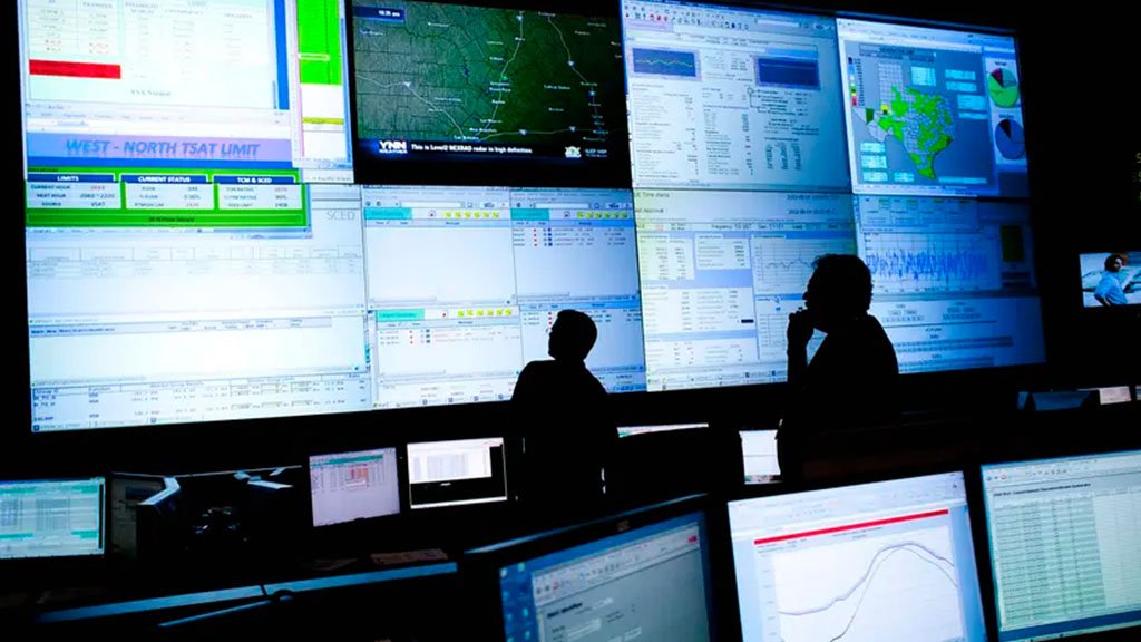 Reliability coordinators monitor the state power grid at the Electric Reliability Council of Texas command center in Taylor in 2012.