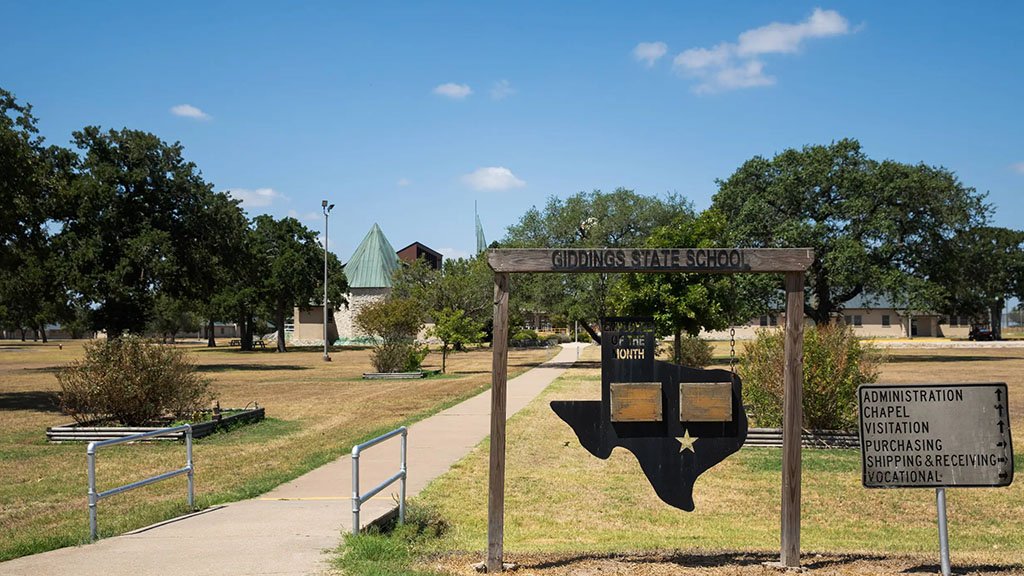The Giddings State School, a Texas Juvenile Justice Department prison in Lee County, on July 20. Last month, the agency reported only 42% of needed security officers at the prison were available.