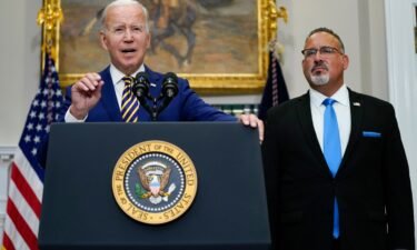 President Joe Biden speaks about student loan debt forgiveness alongside Education Secretary Miguel Cardona on August 24.