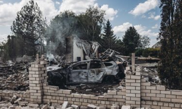 A damaged house and a car are seen after Russian shelling in Kramatorsk