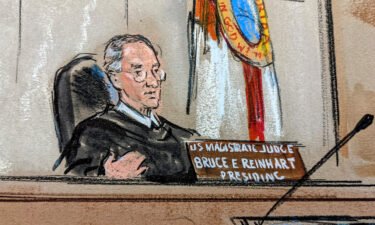 US Magistrate Judge Bruce Reinhart is seen in the courtroom on August 18 in West Palm Beach