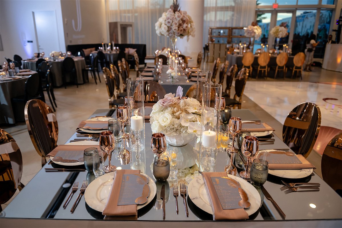 <i>Courtesy M by Michaela Photography</i><br/>A table setting at Jamaicia and Jamal's wedding is pictured here.