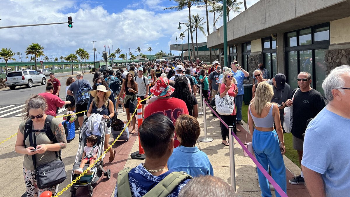 <i>Gado/Getty Images</i><br/>Long security lines are seen outside the Kahului airport in Maui