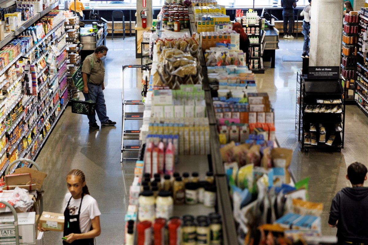 <i>Ting Shen/Xinhua/Getty Images</i><br/>Customers shop at a supermarket in Washington