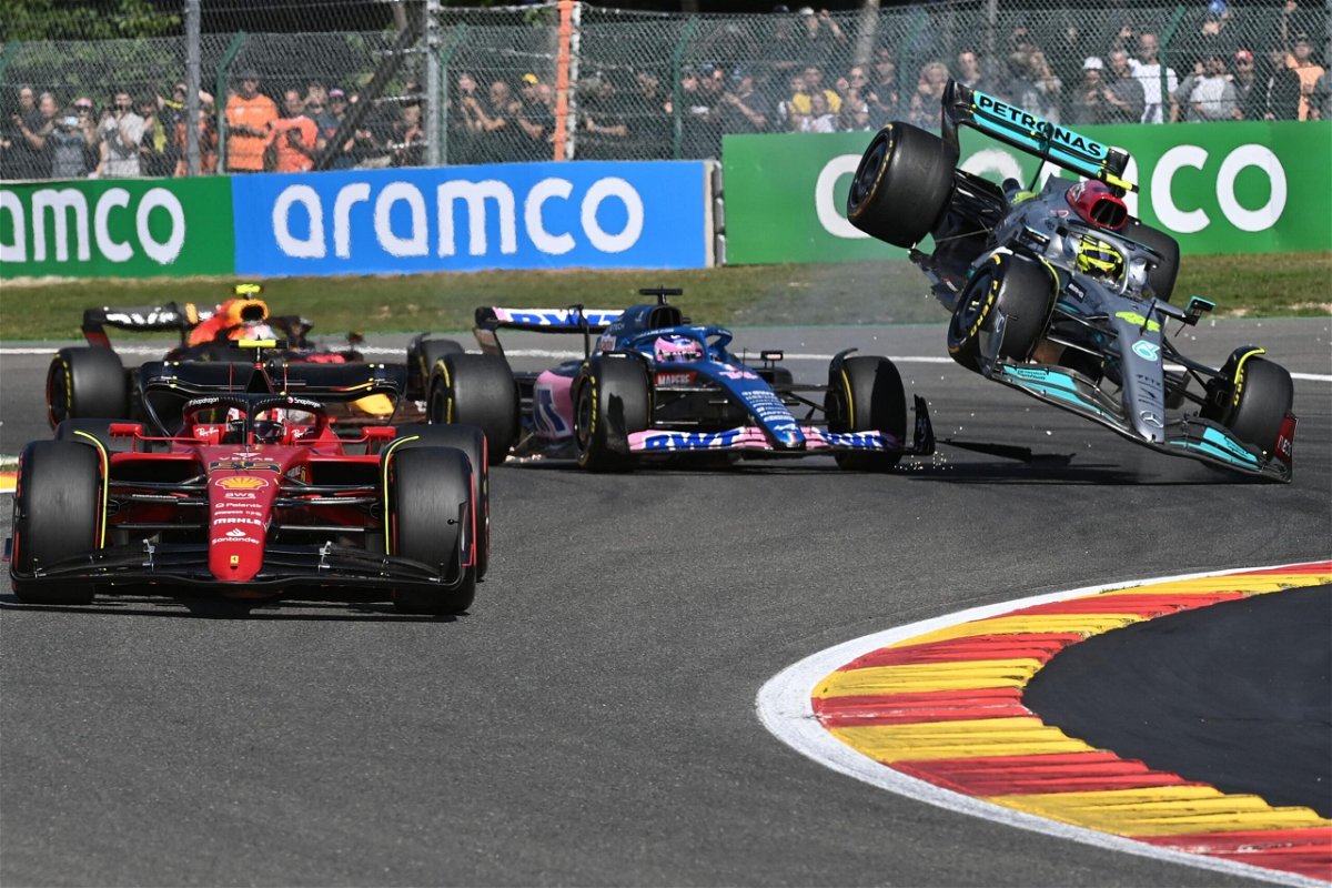 <i>JOHN THYS/AFP/AFP via Getty Images</i><br/>Hamilton collides with Fernando Alonso.