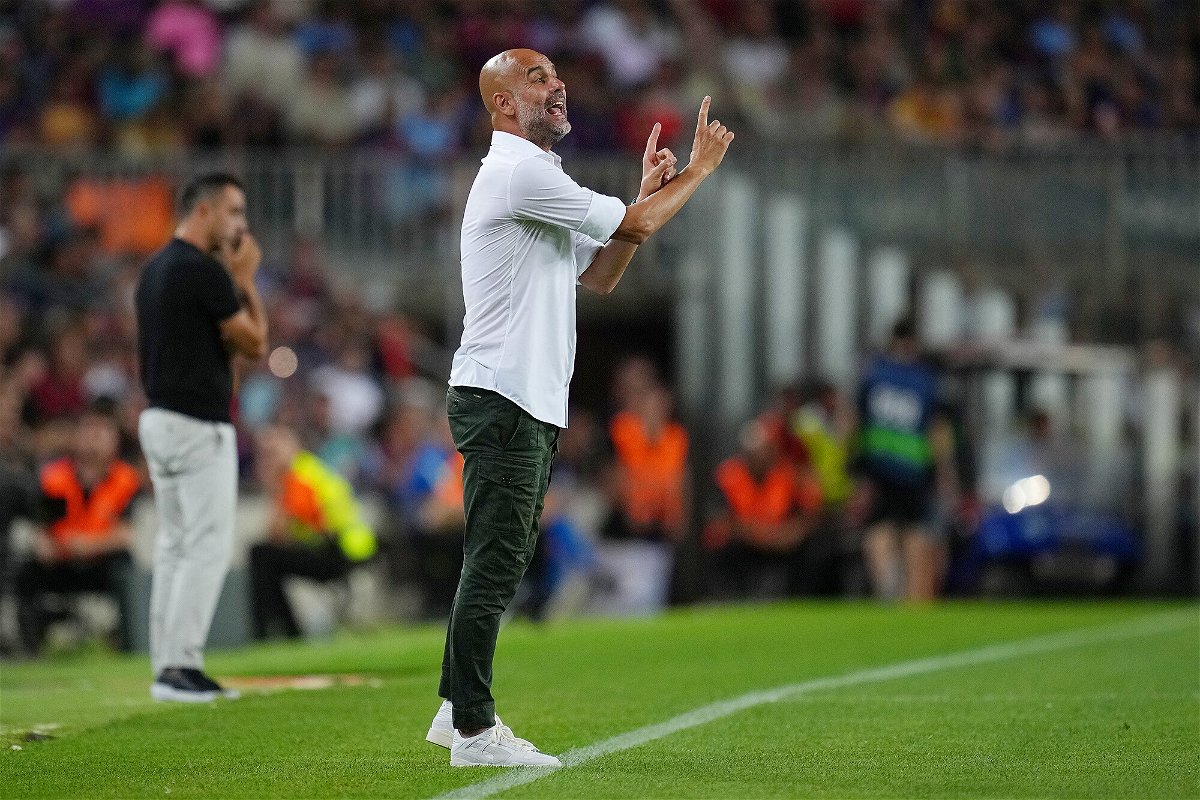 <i>Alex Caparros/Getty Images</i><br/>Pep Guardiola delivers instructions to his Manchester City side against Barcelona.