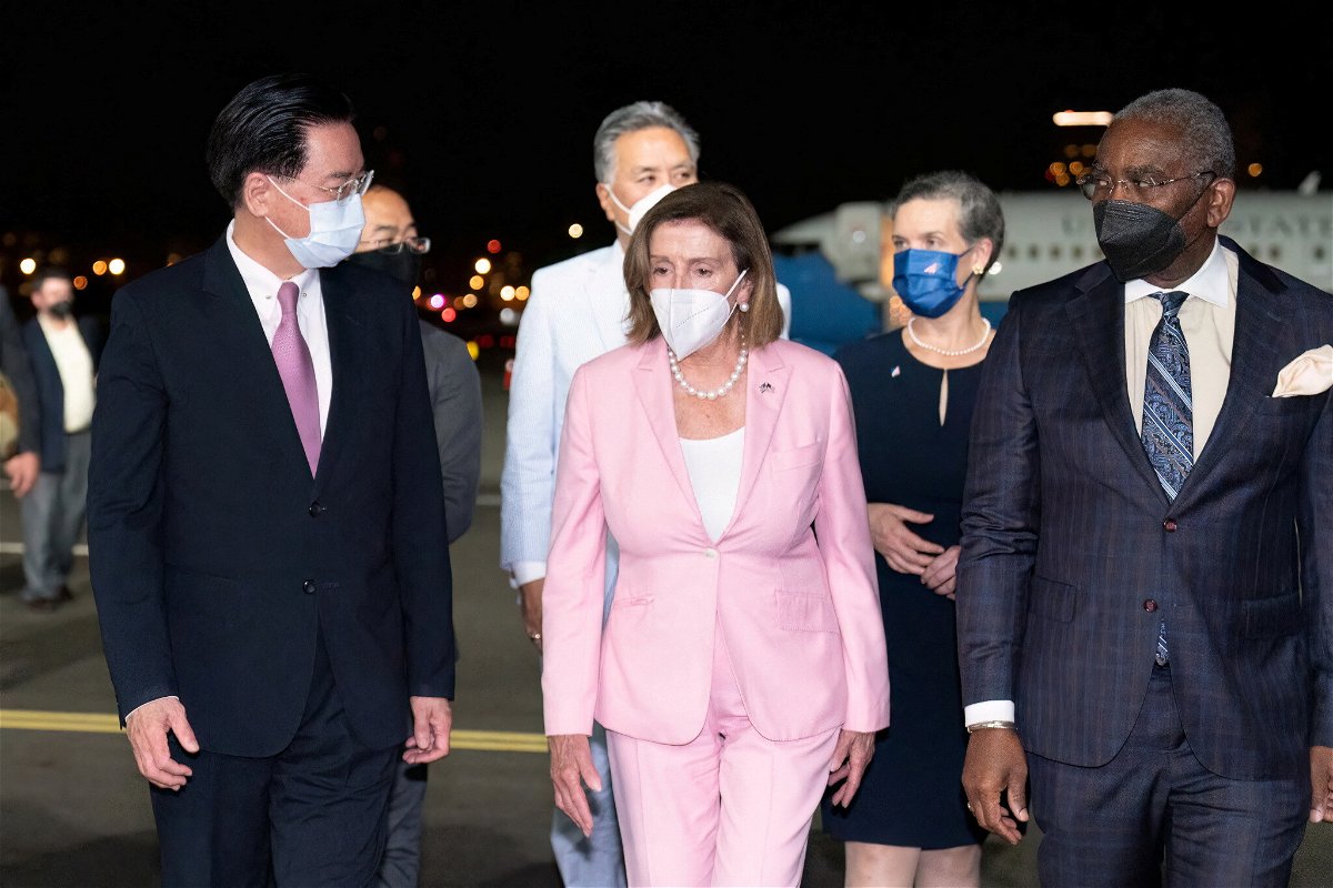 <i>Taiwan Ministry of Foreign Affairs/Reuters</i><br/>Why Nancy Pelosi's pink suit in Taiwan was about more than power-dressing. Pelosi
