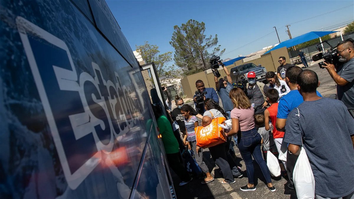 Migrants board a chartered bus to New York at the city of El Paso's Welcome Center on Friday, Sept. 15.