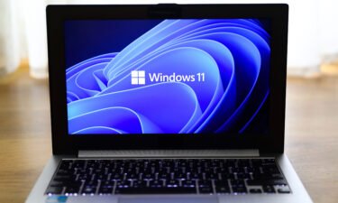Windows 11 operating system logo is displayed on a laptop screen in Gliwice