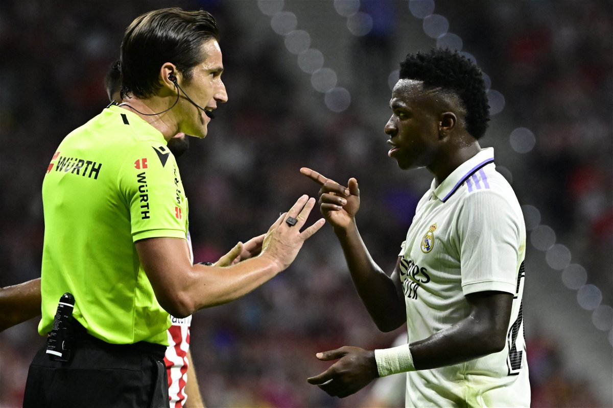 <i>JAVIER SORIANO/AFP/AFP via Getty Images</i><br/>Vinicius Junior (right) as the target of racist chanting from Atletico Madrid fans before the match.