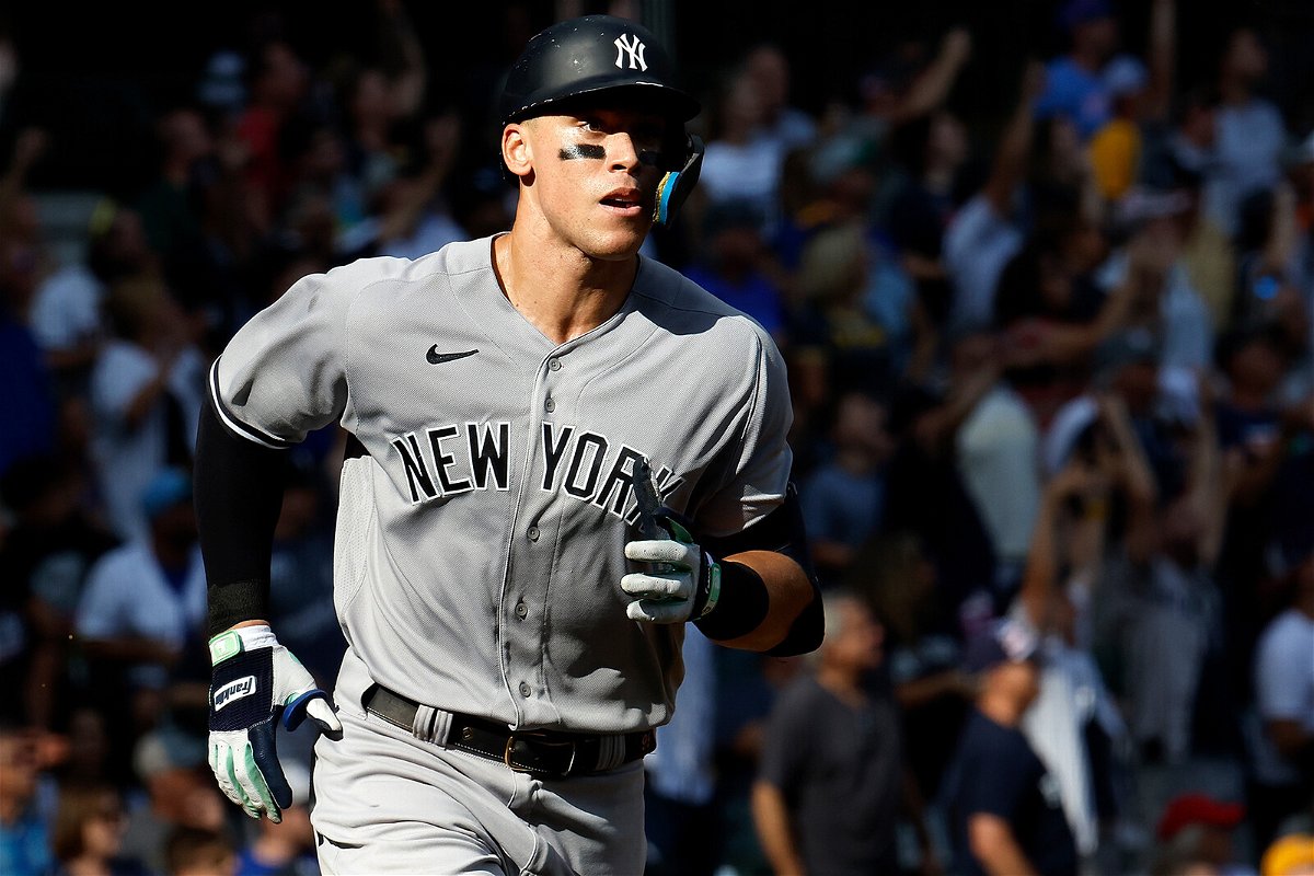 <i>John Fisher/Getty Images</i><br/>Aaron Judge hit home runs number 58 and 59 in the New York Yankees' 12-8 win over the Milwaukee Brewers. He's now two away from tying Roger Maris' single-season AL record.