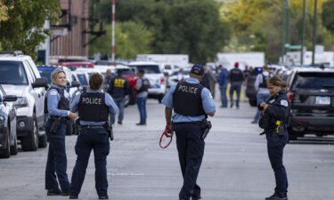 Chicago police are seen here investigating a shooting at the Homan Square police facility on September 26