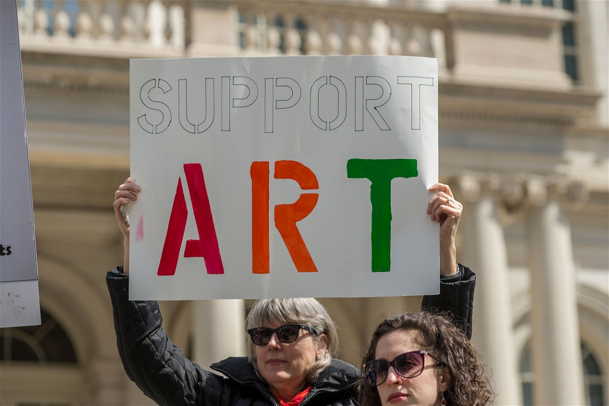 <i>Albin Lohr-Jones/Sipa/AP</i><br/>Supporters of New York City's arts and cultural activities are seen at a rally in 2017. President Joe Biden issued an executive order on September 30 that includes a provision reestablishing the President's Committee on the Arts and the Humanities.