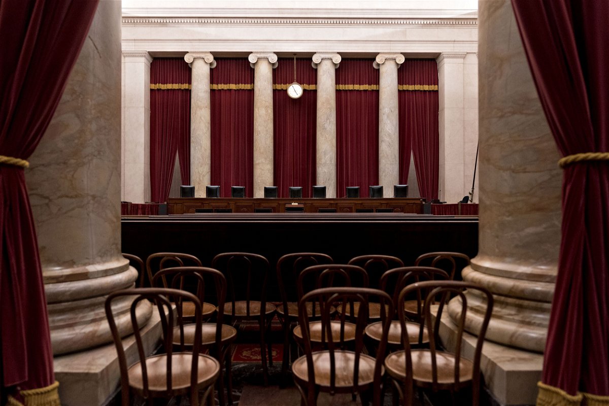 <i>Andrew Harrer/Bloomberg/Getty Images</i><br/>Chairs of U.S. Supreme Court justices sit behind the courtroom bench in Washington
