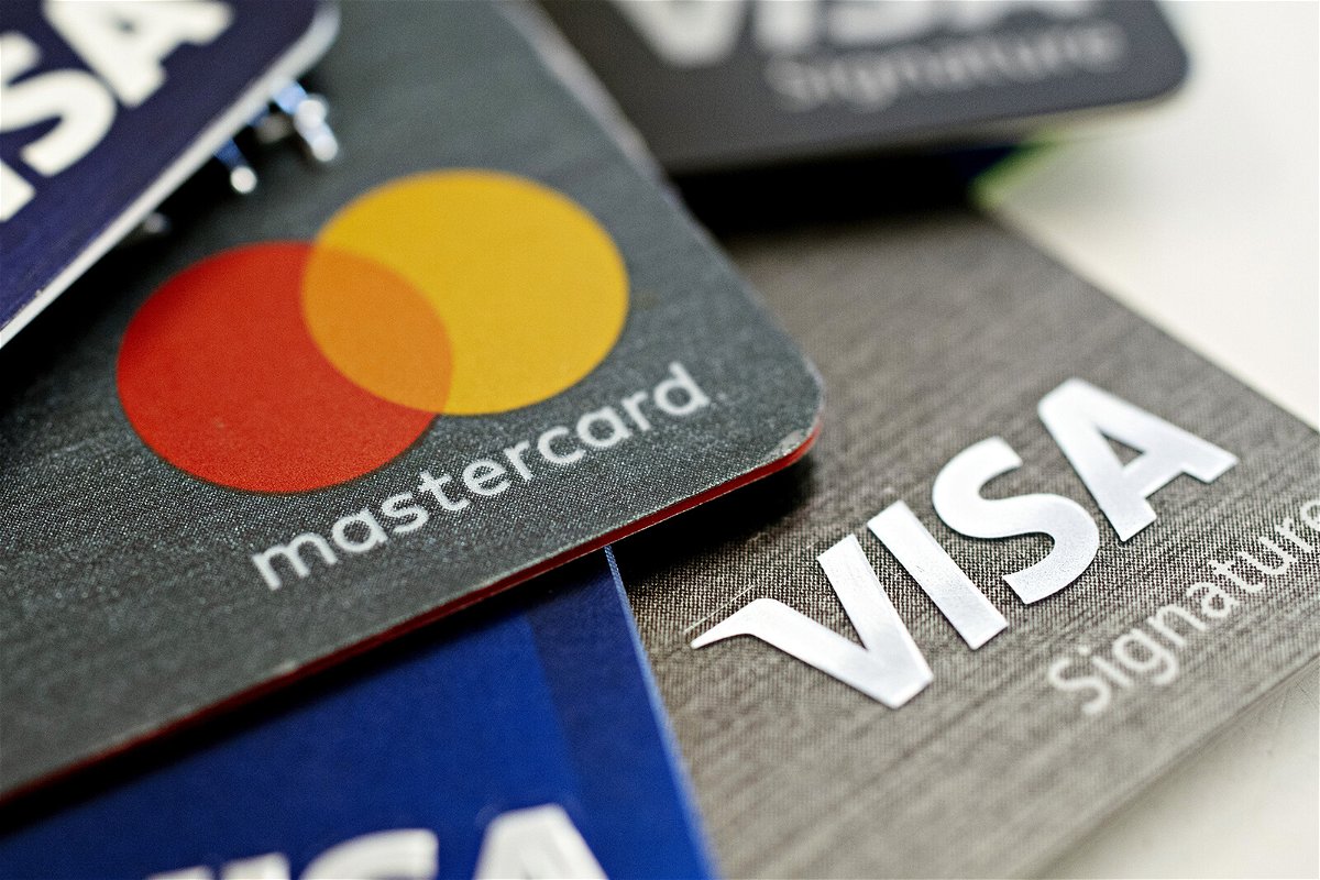 <i>Daniel Acker/Bloomberg/Getty Images</i><br/>US credit card giants said they will implement a new merchant category code for the nation's gun retailers. Visa and Mastercard credit cards are arranged for a photograph in Tiskilwa