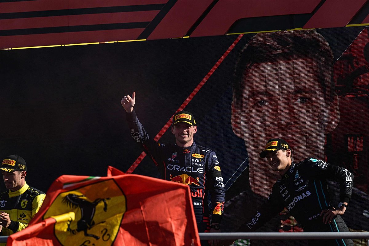 <i>MIGUEL MEDINA/AFP/AFP via Getty Images</i><br/>Max Verstappen celebrates victory at the Italian Grand Prix as he continues his F1 title defense.
