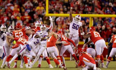 Harrison Butker kicks the game-tying field goal for the Kansas City Chiefs against the Buffalo Bills at the end of the fourth quarter to send it in to overtime in the AFC Divisional game at Arrowhead Stadium on January 23.