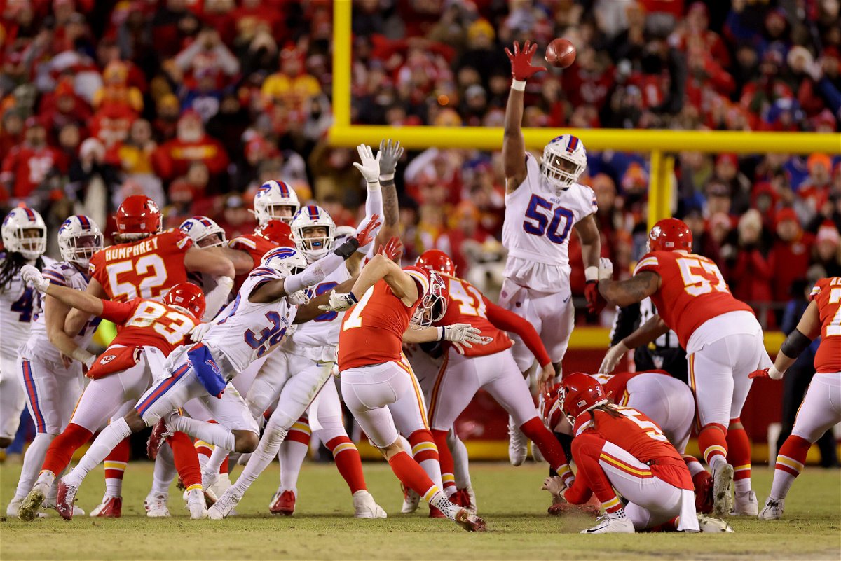 <i>David Eulitt/Getty Images</i><br/>Harrison Butker kicks the game-tying field goal for the Kansas City Chiefs against the Buffalo Bills at the end of the fourth quarter to send it in to overtime in the AFC Divisional game at Arrowhead Stadium on January 23.