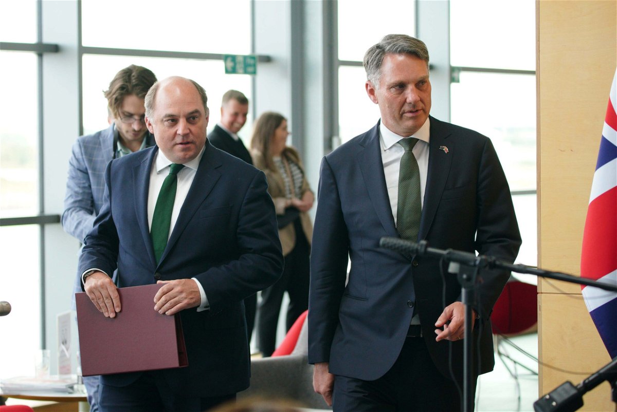 <i>Peter Byrne/PA Images/Getty Images</i><br/>UK Defense Secretary Ben Wallace (L) and Australian Deputy Prime Minister Richard Marles are seen here at BAE systems in Barrow-in-Furness on August 31.